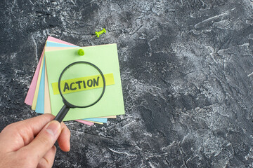 top view action written note on sticker on gray background paper college lesson notepad note school...