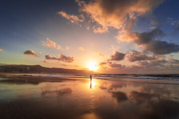 Beautiful sunset on the beach of Las Canteras in Las Palmas de Gran Canaria