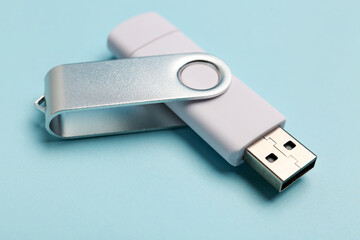 White USB flash drive on color background
