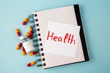 top view antivirus vaccine with health note and pills on blue background lab disease virus health pandemic covid- color isolation