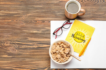 Composition with card, cup of coffee, corn flakes and notebook on wooden background