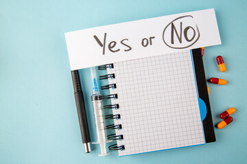 top view antivirus vaccine with pills injection and note on blue background lab disease virus health pandemic covid- color