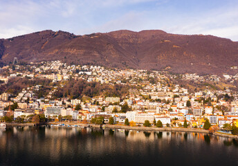 Fototapeta na wymiar Residential buildings of Locarno along shore of Lake Maggiore in Ticino canton, Switzerland.
