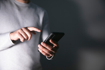 man hand holding smart phone..