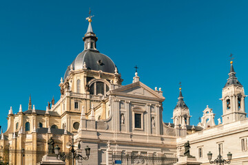 Fototapeta na wymiar Cathedral church Catedral de Santa María la Real de la Almudena in front of the royal palace, Madrid spain