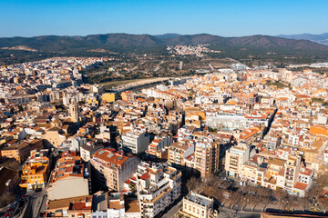 Fototapeta na wymiar Aerial photo of Spanish town El Vendrell with view of residential buildings and skyline.