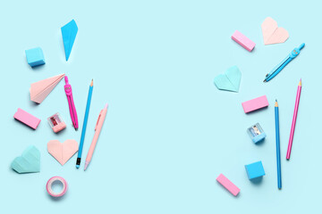 Frame made of school stationery on blue background. Children's Day celebration