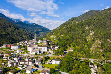 Fototapeta na wymiar Scenic aerial view of Swiss hamlet of Intragna in Centovalli valley in Alpine highlands in summertime, Locarno district, canton Ticino .