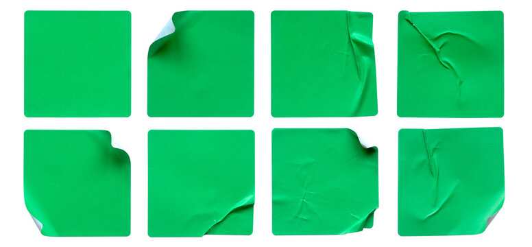 A set of green square paper sticker label isolated on white background.	