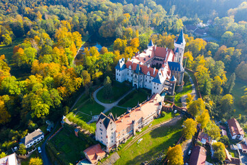 Picturesque autumn landscape with imposing historical castle Zleby Castle in a Czech village in the...