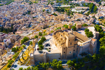 Scenic aerial view of Spanish city of Caravaca de la Cruz with old Castle and Basilica of Vera Cruz