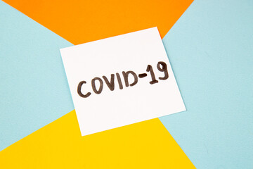 top view covid- writing on colored background color hospital lab virus health covid- pandemic science