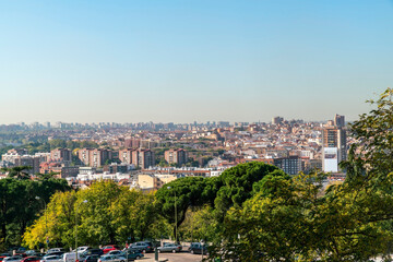 Fototapeta na wymiar view of the cityscape of Madrid from the royal palace lookout plaza de la armeria, Madrid, Spain