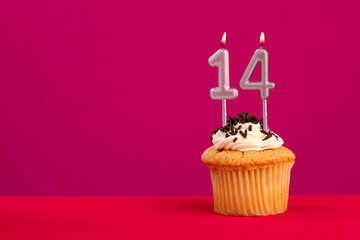 Birthday cake with candle number 14 - Rhodamine Red foamy background