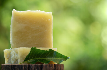 Neem soap on nature background.