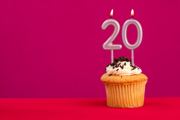 Birthday cake with candle number 20 - Rhodamine Red foamy background