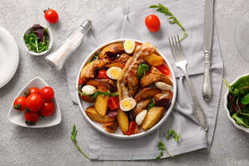 Composition with tasty potato salad on light background, top view