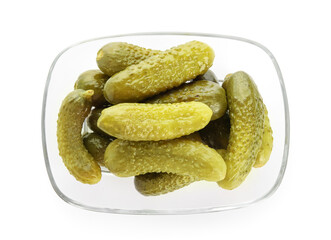 Bowl with tasty fermented cucumbers on white background