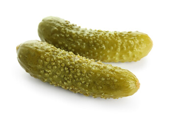 Tasty fermented cucumbers on white background