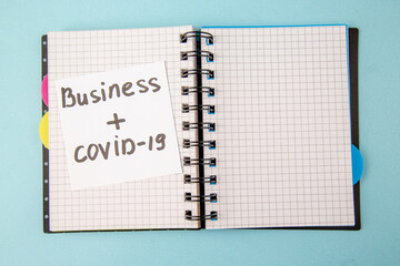 top view open copybook with business covid on blue background color notepad school study student college lesson