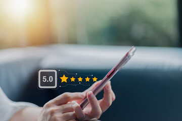 Customer giving a five star rating on smartphone. Review, Service rating, satisfaction, Customer...