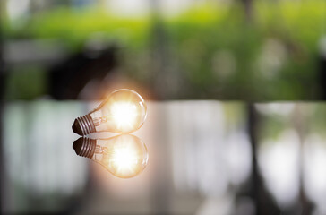 Classic light bulb. Turn on and off tungsten light bulbs, show ideas, innovations, energy savings, old Evolution ideas, or retro light bulbs. New idea concept.