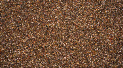 a lot of small colorfull pebbles background theme