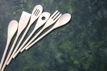 top view plastic utencils on a dark background knife kitchen cutlery dinner wood color food