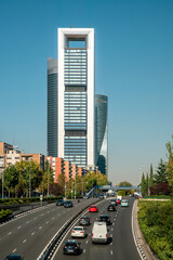 Road at Financial business district in Madrid with Cuatro Torres towers area, spain