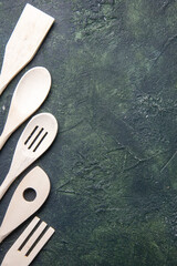 top view plastic utencils on dark background spoon knife photo fork plastic dinner cutlery kitchen...