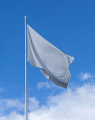 white flag with clouds