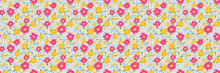 Vibrant flower repeating pattern with pink, yellow and blue flowers