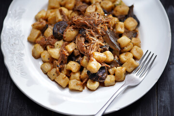 italian gnocchi potato dumplings in duck ragu meat sauce