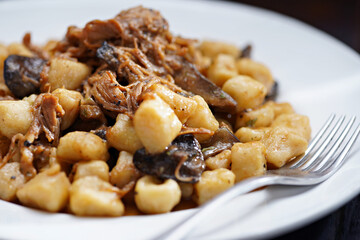 italian gnocchi potato dumplings in duck ragu meat sauce