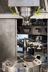 Lathe machine tool with cooling system in metalworking plant