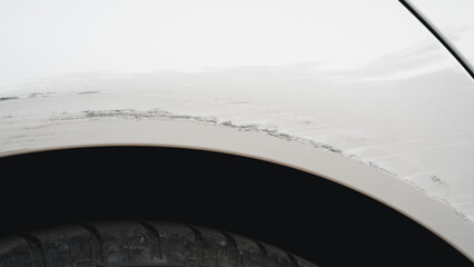 Deep scratches and paint damage on a bumper vehicle. car scratch and dent. accident involving a car crash