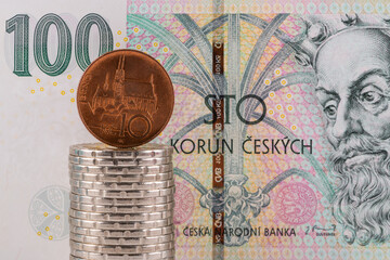 10 CZK coin and 100 CZK banknote