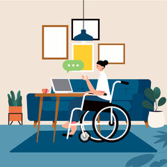 Disabled woman sitting in wheelchair working with laptop computer on table at home,