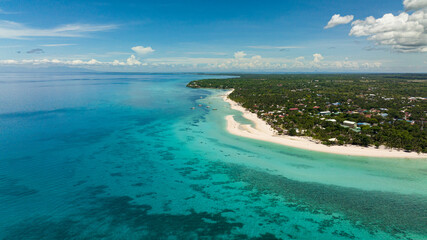Fototapeta na wymiar Aerial view of tropical island with a beautiful beach. Kota Beach. Bantayan island, Philippines.
