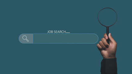 Man using magnifying glass searching Job search, find a job, job interview.