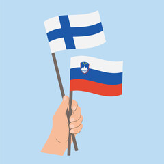 Flags of Finland and Slovenia, Hand Holding flags