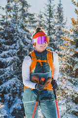 Mountaineer backcountry ski walking ski alpinist in the mountains. Ski touring in alpine landscape with snowy trees. Adventure winter sport. Kralova hola, Slovakia © Zedspider
