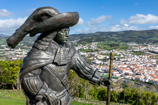 View of the city of Angra do Heroismo. Statue of D. Afonso VI, on Mount Brazil. Historic fortified city and the capital of the Portuguese island of Terceira. Azores. Portugal.
