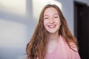 Portrait of young beautiful cute cheerful girl