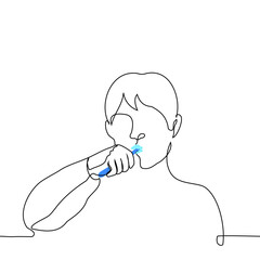 man brushes his teeth with a toothbrush, his in toothpaste foam - one line drawing vector. concept brushing teeth, oral hygiene
