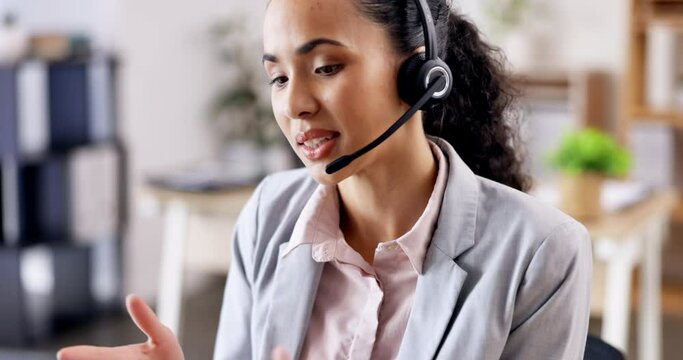 Woman at callcenter with phone call, talking and contact us, communication and headset with mic and help desk worker. CRM, customer service and female consultant with laptop, conversation and telecom