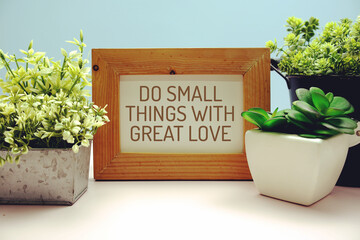 "Do Small Things With Great Love" Inspirational and motivational quote written on paper card