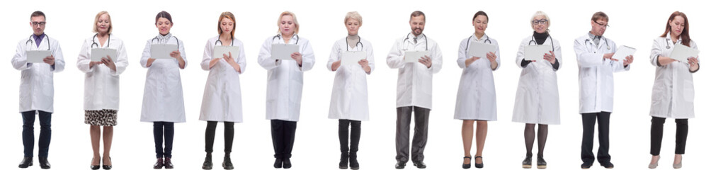 Fototapeta premium group of doctors with clipboard isolated on white