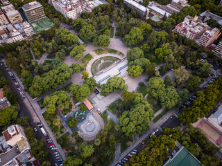 Beautiful aerial view to city buildings and green public square