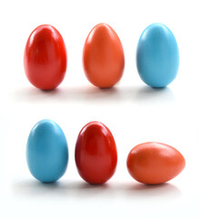 Easter Eggs closeup. Set of few colorful dyed eggs isolated on white background. Colored in red, orange and gentle blue, rubbed with olive oil for shine and brightness accordong to Greek tradition.